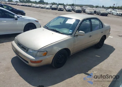 1996 Toyota Corolla Dx z USA, uszkodzony, nr VIN 1NXBB02E5TZ357940